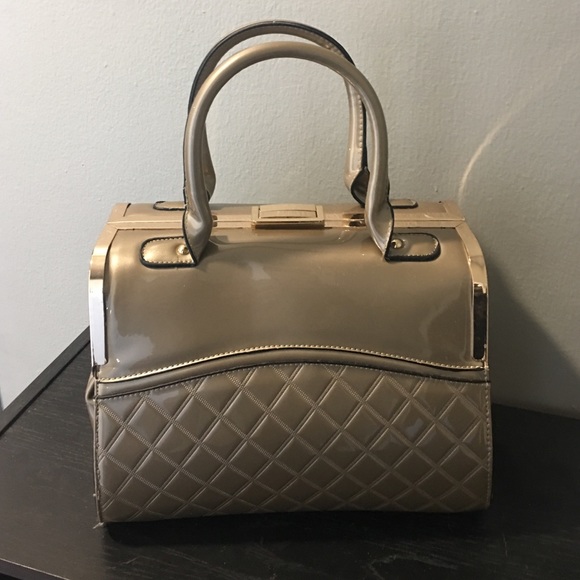 New never used... without tags. Gold purse