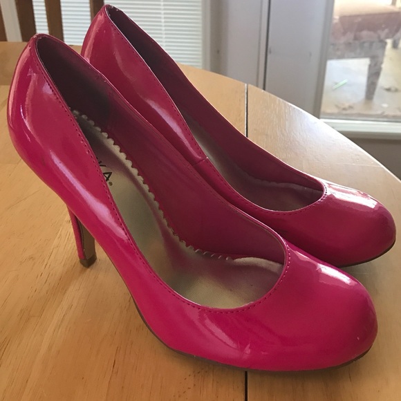 Neon pink pumps