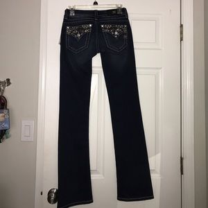 Dark Miss Me Jeans with embellished pockets