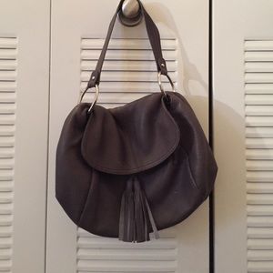 Gray tasseled purse