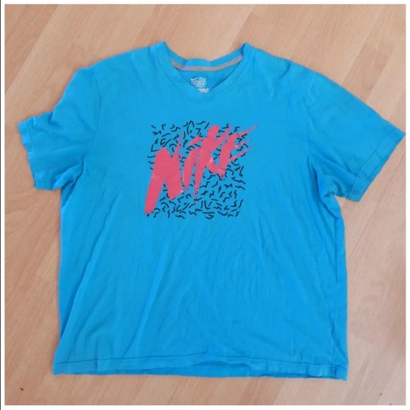 pink black nike shirt