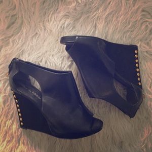 Open-toed, studded black wedges