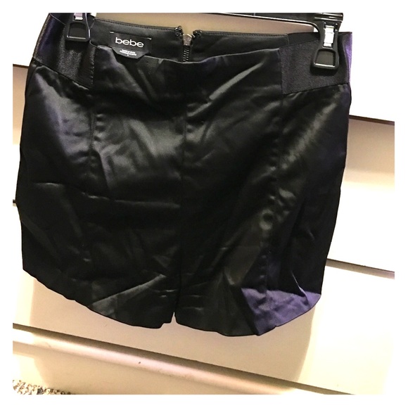 Black high waisted BEBE shorts.