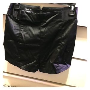 Black high waisted BEBE shorts.