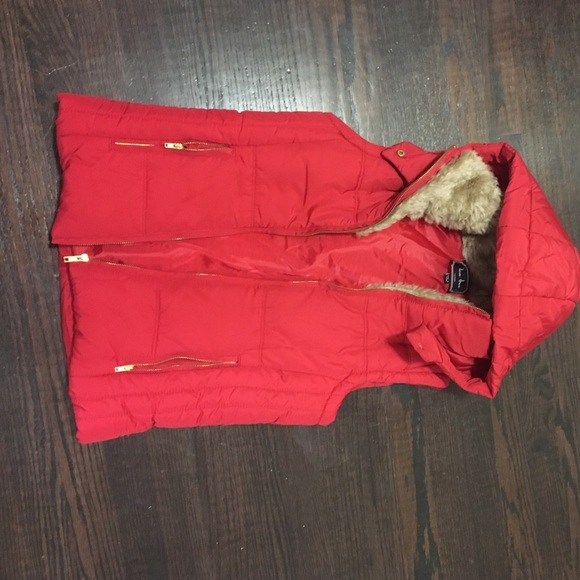 Red puffer vest with hood and fur