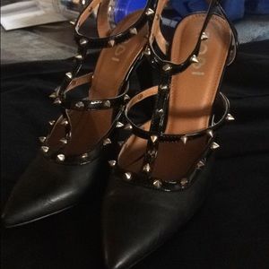 Black studded pointed heels