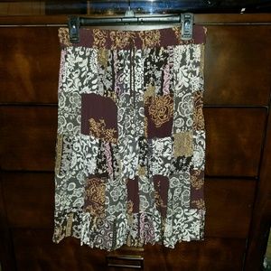 SOLD.           Beautiful knee length patchwork skirt