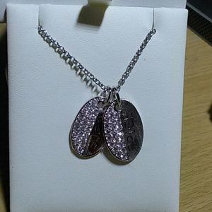 CRISLU genuine sugar and spice dog tag pendant