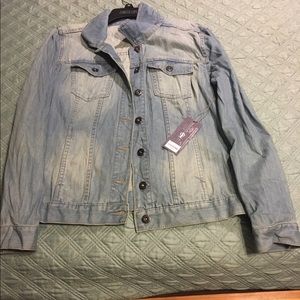 Brand new jean jacket by Jennifer Lopez.