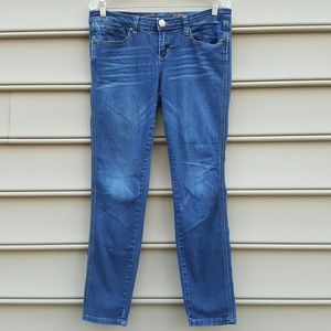 SEVEN (7) SKINNY WISKERED JEWEL RIVETS JEANS