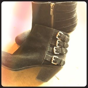 Black suede booties with buckles