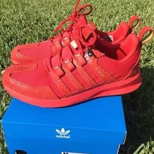 Adidas SL loop Tubular Reptilian