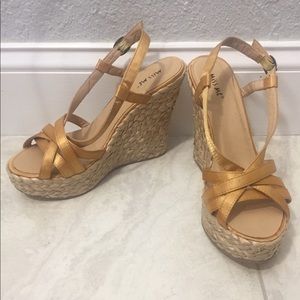 Golden satin strap wedges