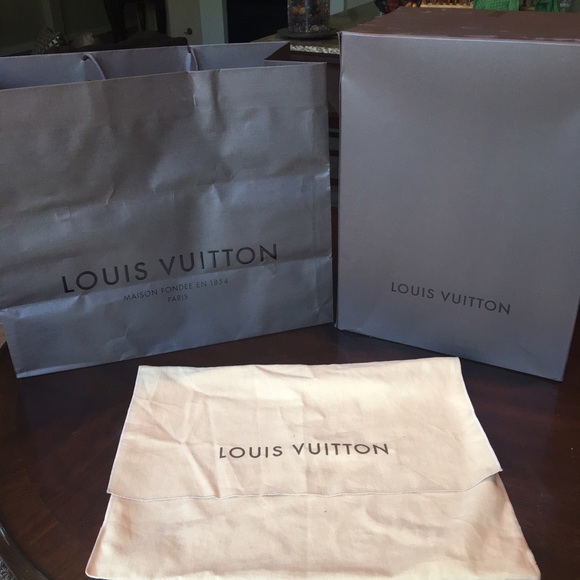 Louis Vuitton dust bag, shopping bag and box.