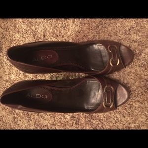 Aldo brown peep toe pumps w buckles. Sz 37