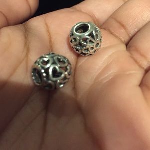 Two original pandora charms