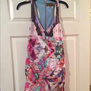 Knee length Nicole Miller.