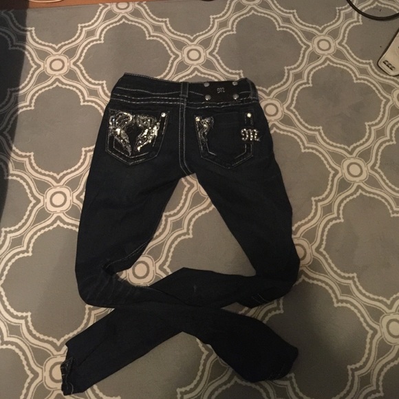 They are shinny miss me jeans