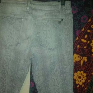 Snake print skinny jeans