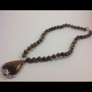 Jewelry necklace eye of tiger stones. New