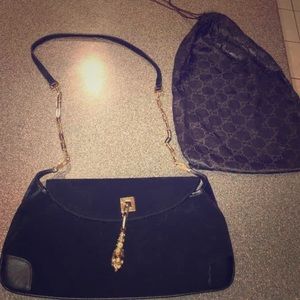Authentic Gucci purse w/gold panther ornament