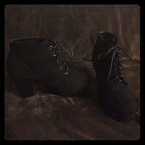 Black lace heeled boots