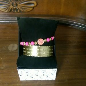 Pink and gold bracelets