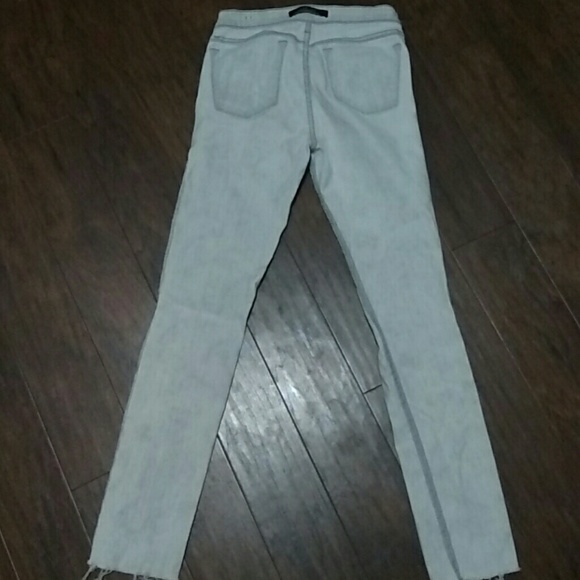 Light gray skinny j brand distressed jeans