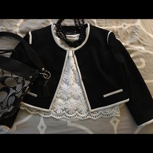 Audrey Hepburn inspired black with white jacket.