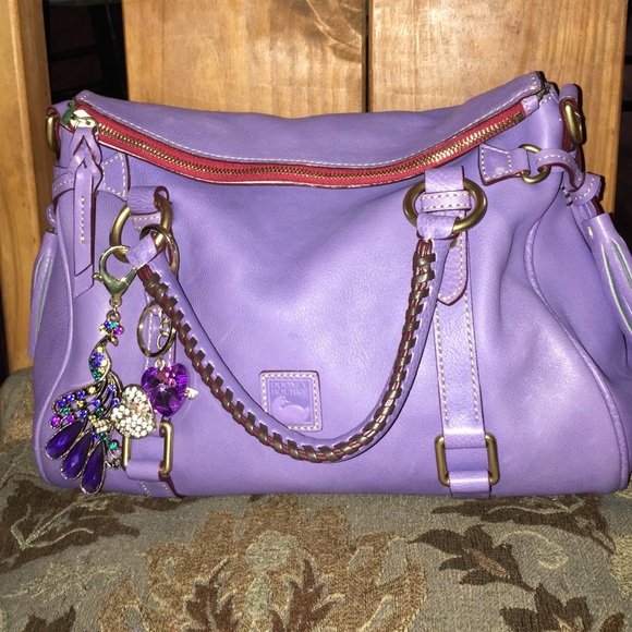 Dooney and Bourke lavendar florentine for trade
