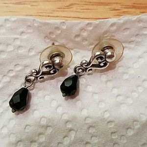 Earrings with black gem.