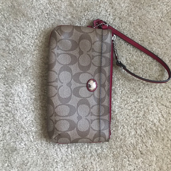 Brown and red Coach wallet/wristlet