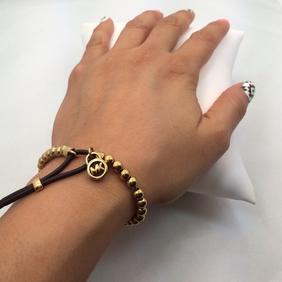 MICHAEL KORS GOLD BRACELET