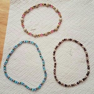 Set of 3 beaded bracelets.