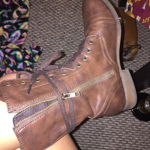 Brown leather combat boots