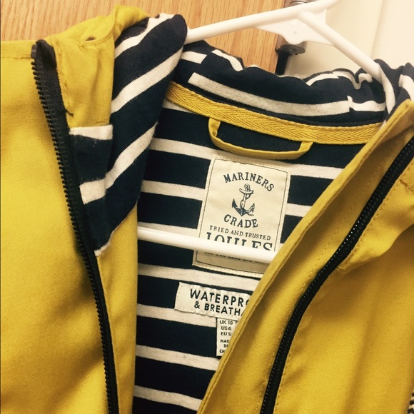 Joules: Mustard colored rain jacket.