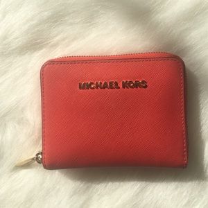 Small Michael Kors zip around wallet