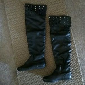 Knee high black leather boots
