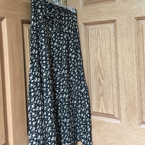 Full length black, pink flower skirt.