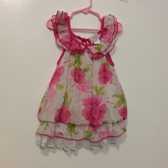 Cute pink florals smocked with lace trim
