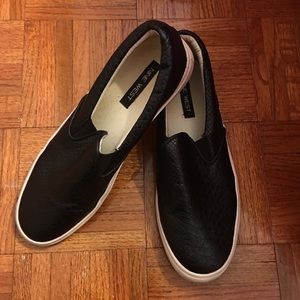 Nine West black snakeskin slip ons