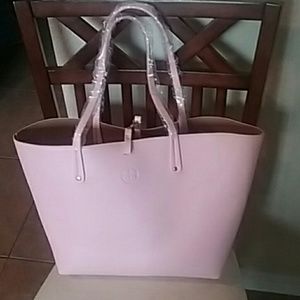 Iman reversible tote bag.