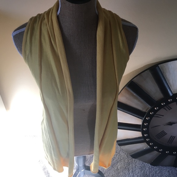 Yellow cotton vest with crochet flowers on back