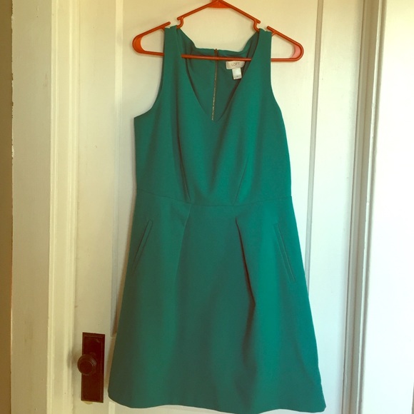 Sea green colored sleeveless v neck dress