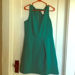 Sea green colored sleeveless v neck dress