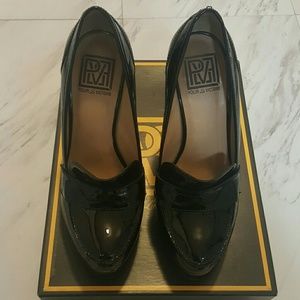 Pour Le Victoire black soft patent stilettos.