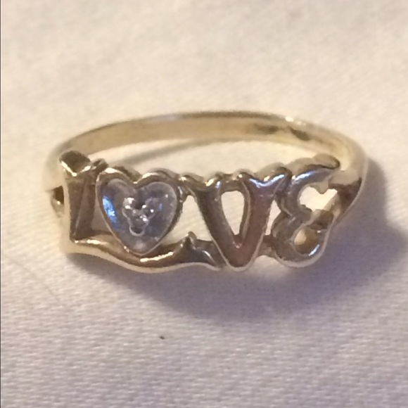 GOLD "LOVE" RING WITH DIAMOND CHIP