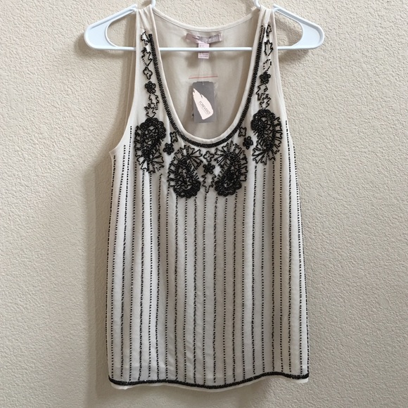 Cream/half white color party wear tank top