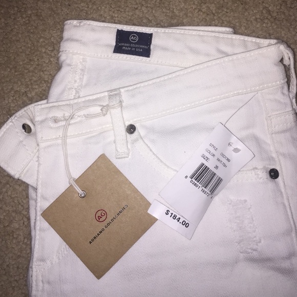 Lightly distressed AG white jeans