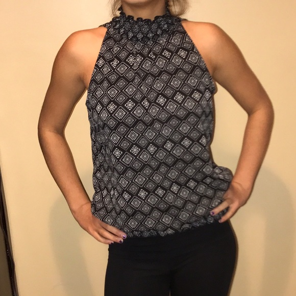 Ruffle sleeveless blouse